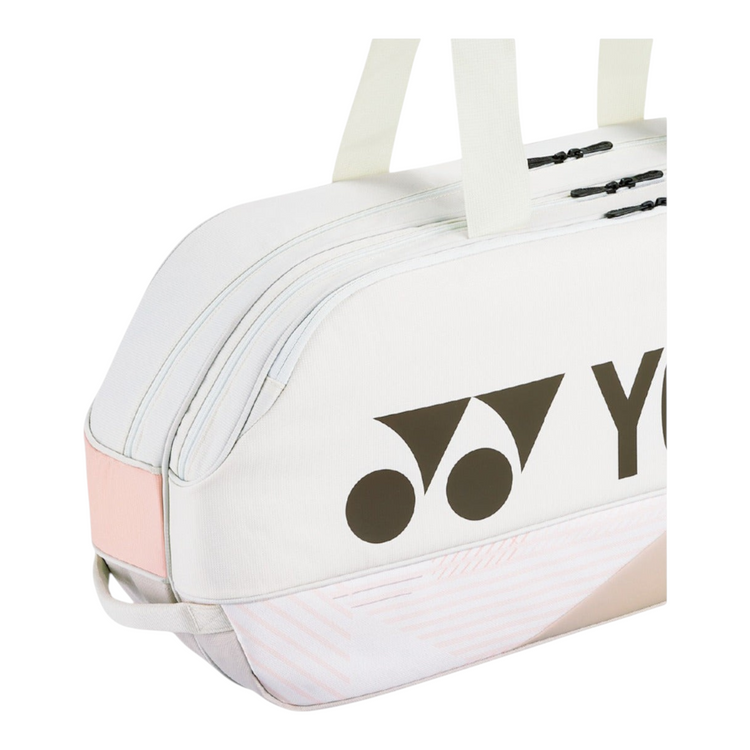 Raquetero Radach Sports Yonex Pro Tournament color beige arena con capacidad para 6 raquetas y cremalleras resistentes