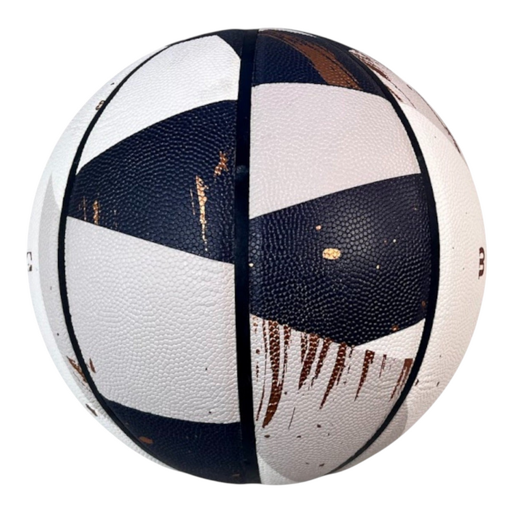 Balón de baloncesto Radach Sports Wilson NBA Expression color champán y negro con diseño geométrico y textura rugosa