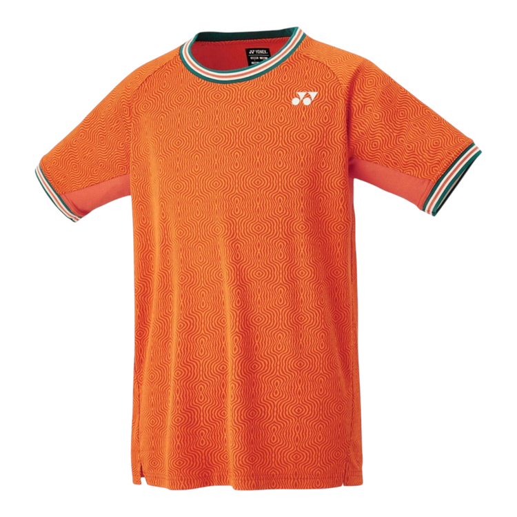 Camiseta deportiva Radach Sports Yonex naranja con patrón geométrico, cuello redondo y detalles en verde y blanco.