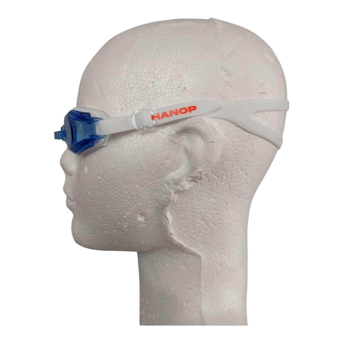 Gafas de natación Radach Sports Hanop Junior en color azul con correa blanca sobre maniquí
