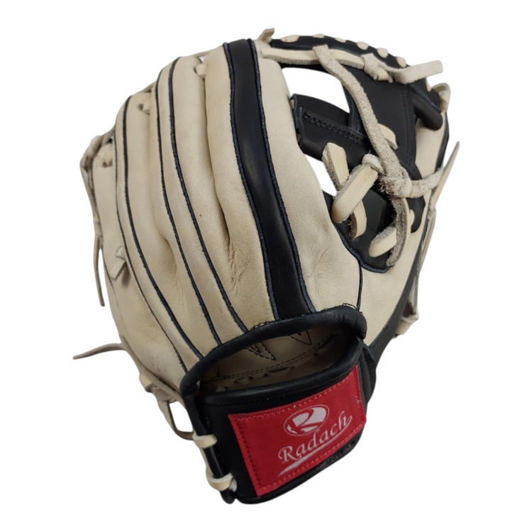 Guante de béisbol Radach Sports Pro de 11.5 pulgadas para cuadro, fabricado en piel color hueso y negro.