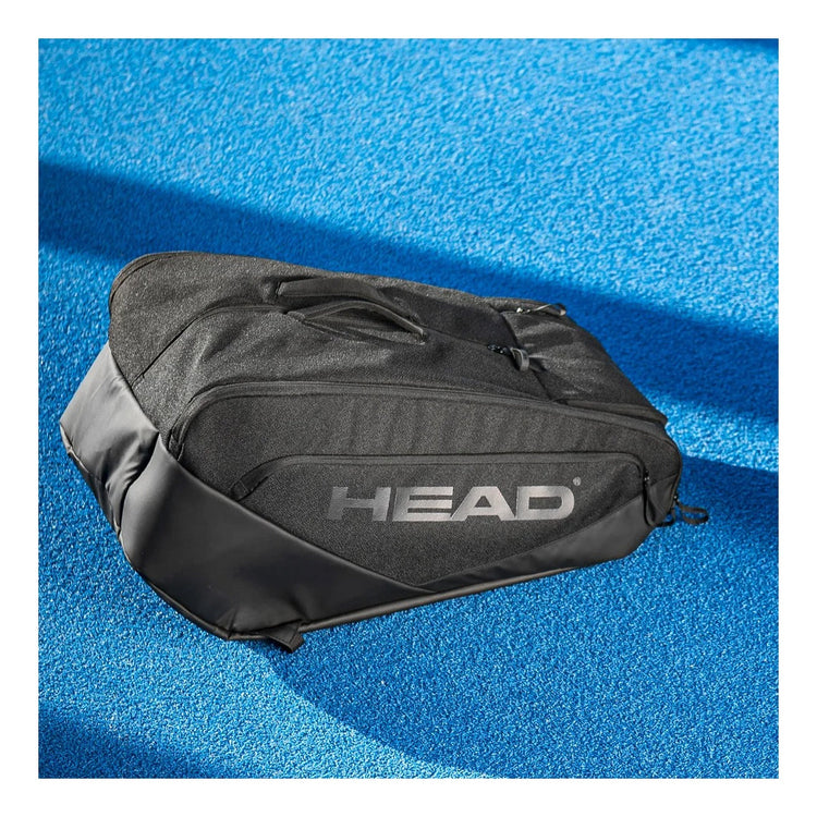 Maleta paletero Radach Sports Head Pro X L en color negro, fabricada con materiales reciclados y diseño resistente.