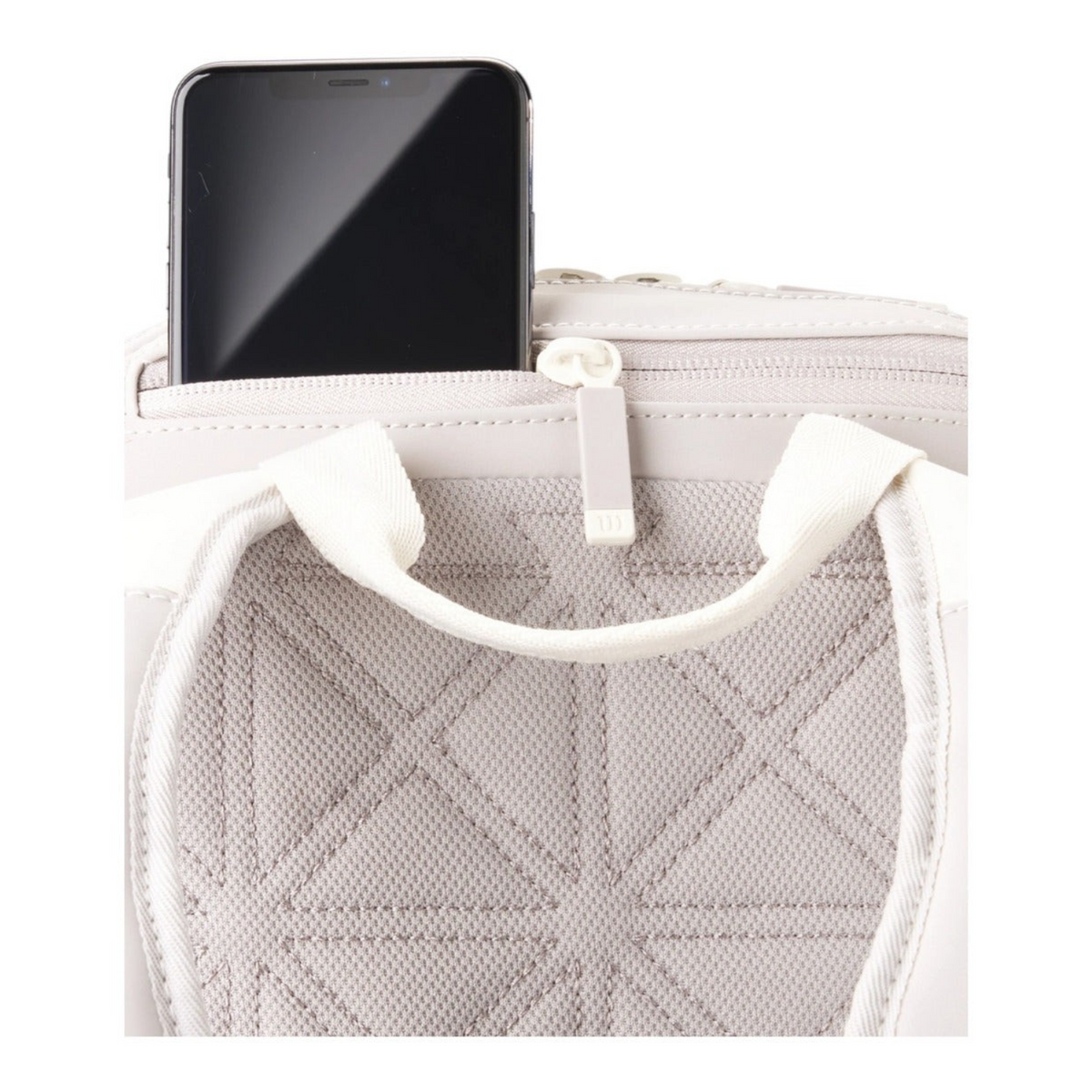 Detalle del bolsillo superior con cremallera de la mochila Radach Sports Wilson Roland Garros 2025 en color crema