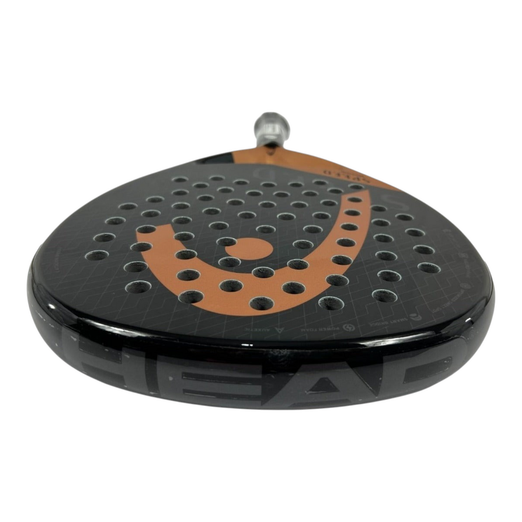Pala de padel Radach Sports Head Speed Motion 2023 en forma de lágrima, color negro con detalles en cobre.