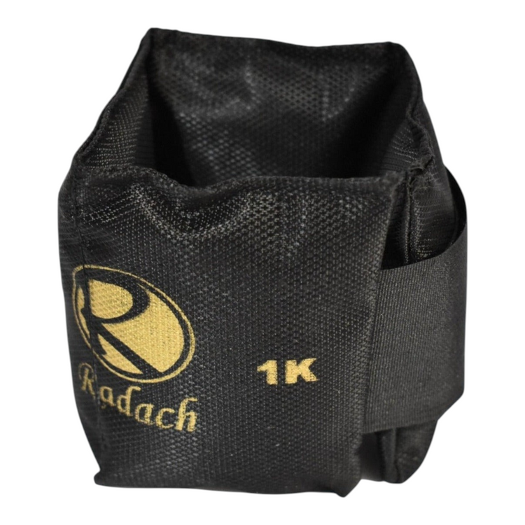 Polaina con peso de 1kg Radach Sports fabricada en lona negra resistente para ejercicios de fortalecimiento muscular