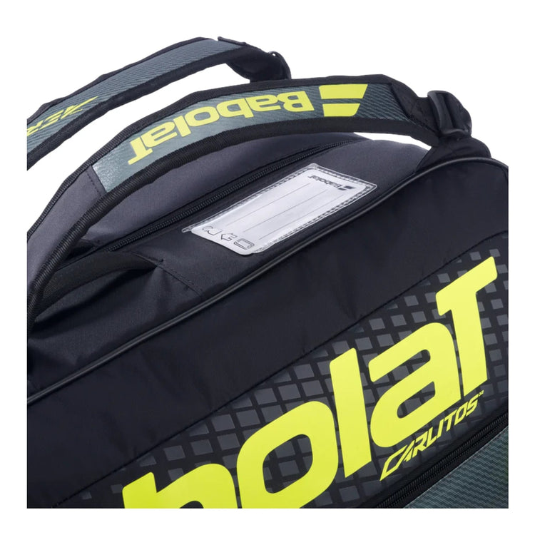 Raquetero Radach Sports Babolat Carlitos Junior 2026 negro y amarillo con correas ergonómicas y etiqueta identificativa