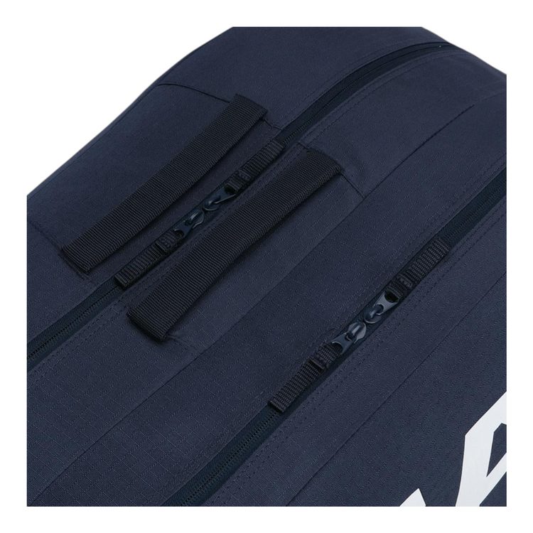 Detalle de cremalleras y asas en el raquetero Radach Sports Head Base M de color azul marino para tenis