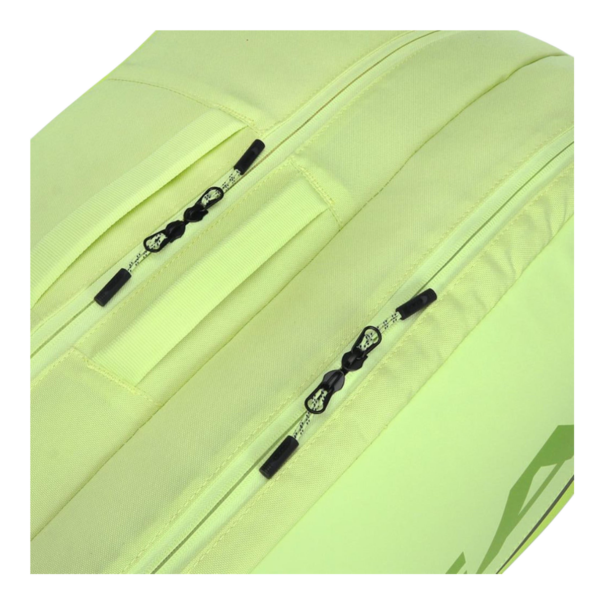Detalle de cremalleras y tejido verde fosforescente del raquetero Radach Sports Head Tour Extreme L