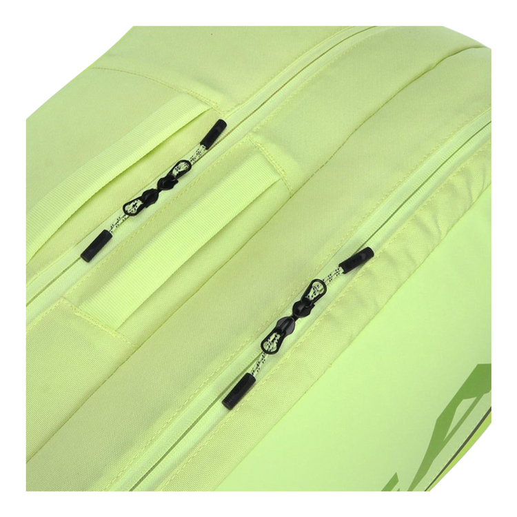 Detalle de cremalleras y tejido verde fosforescente del raquetero Radach Sports Head Tour Extreme L