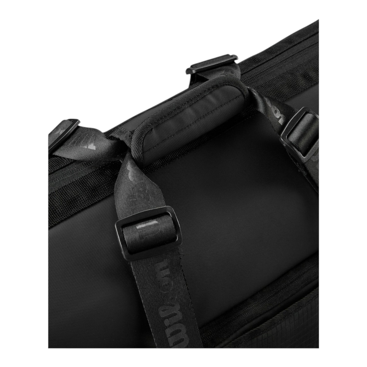 Detalle de las correas ajustables y asa acolchada del raquetero negro Wilson Lifestyle de Radach Sports