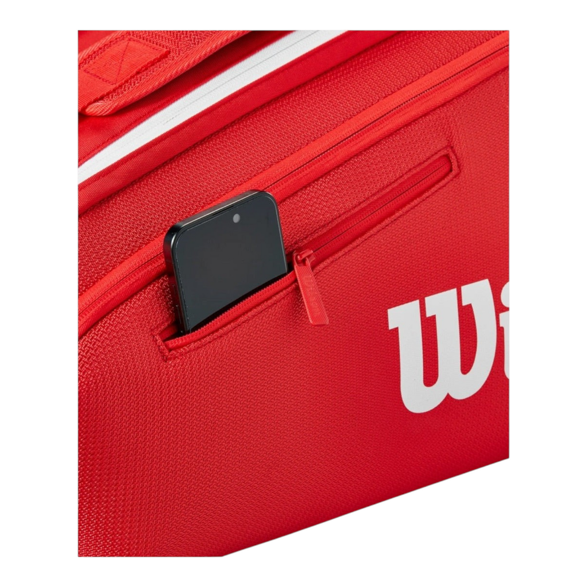 Detalle del bolsillo exterior con cremallera en el raquetero rojo Wilson Super Tour de Radach Sports