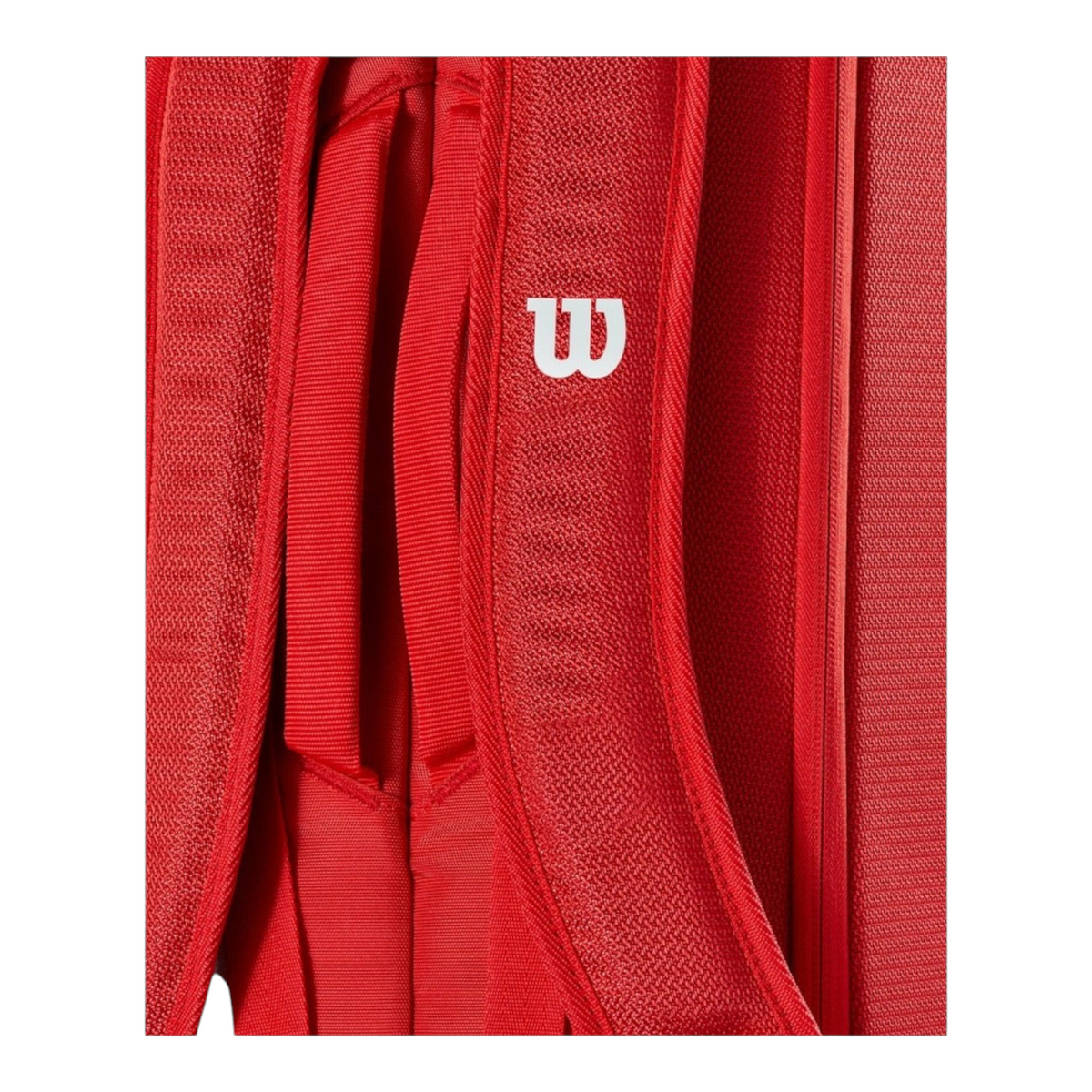 Detalle de las correas acolchadas y ajustables del raquetero Radach Sports Wilson Super Tour rojo de poliéster