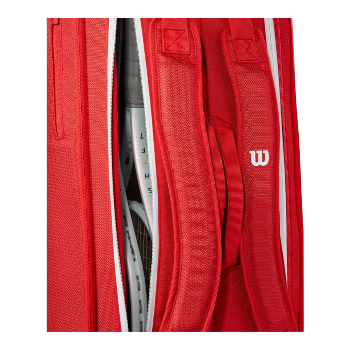 Detalle de correas acolchadas y compartimento de raquetero Radach Sports Wilson Super Tour rojo para 9 raquetas