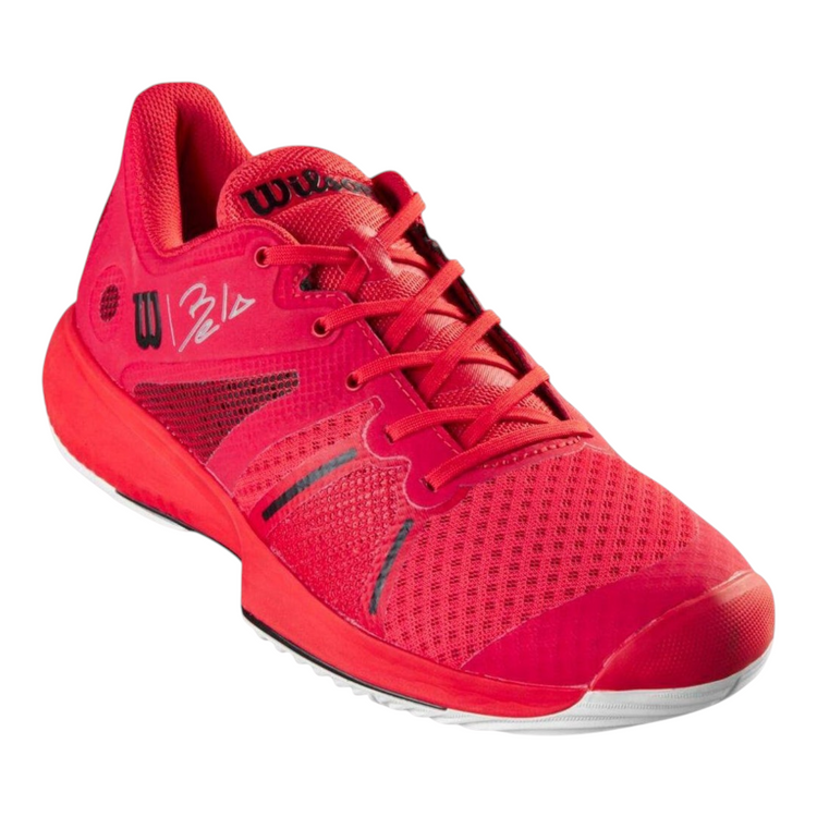 Tenis de padel Radach Sports Wilson Bela Pro en color rojo con diseño técnico de malla y firma de Fernando Belasteguín
