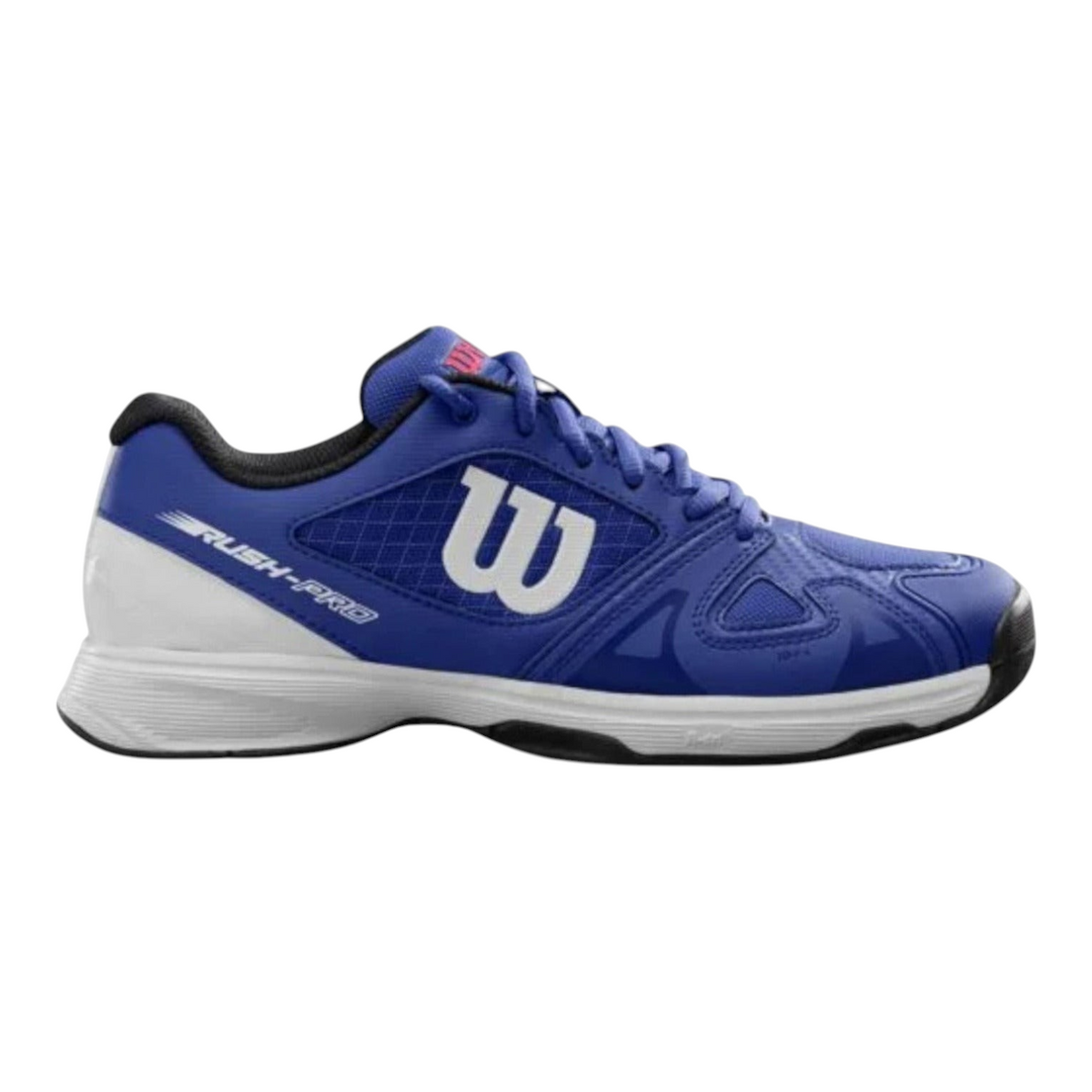 Tenis Radach Sports Wilson Rush Pro Jr 2.5 para niño en color azul con malla sintética y suela de alta tracción.