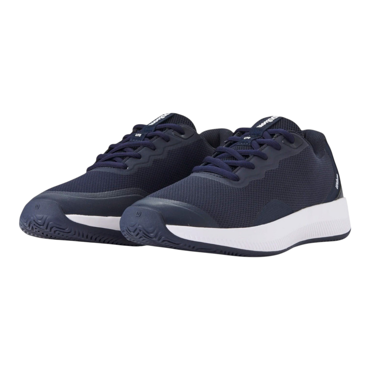 Tenis Wilson Intrigue Lite para mujer en color azul marino con suela blanca, ideales para tenis y pádel en Radach Sports