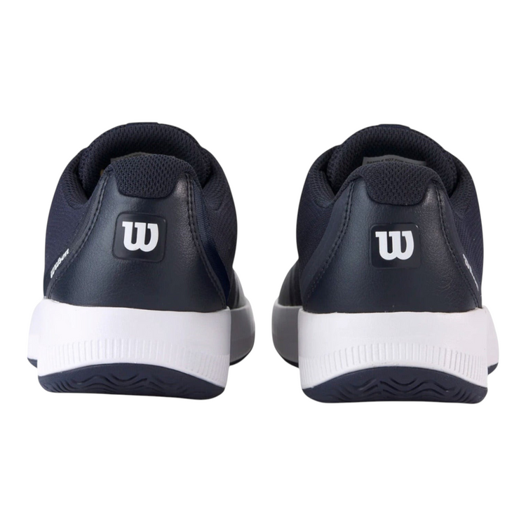Vista trasera de tenis Wilson Intrigue Lite para dama en color azul marino con suela blanca de Radach Sports