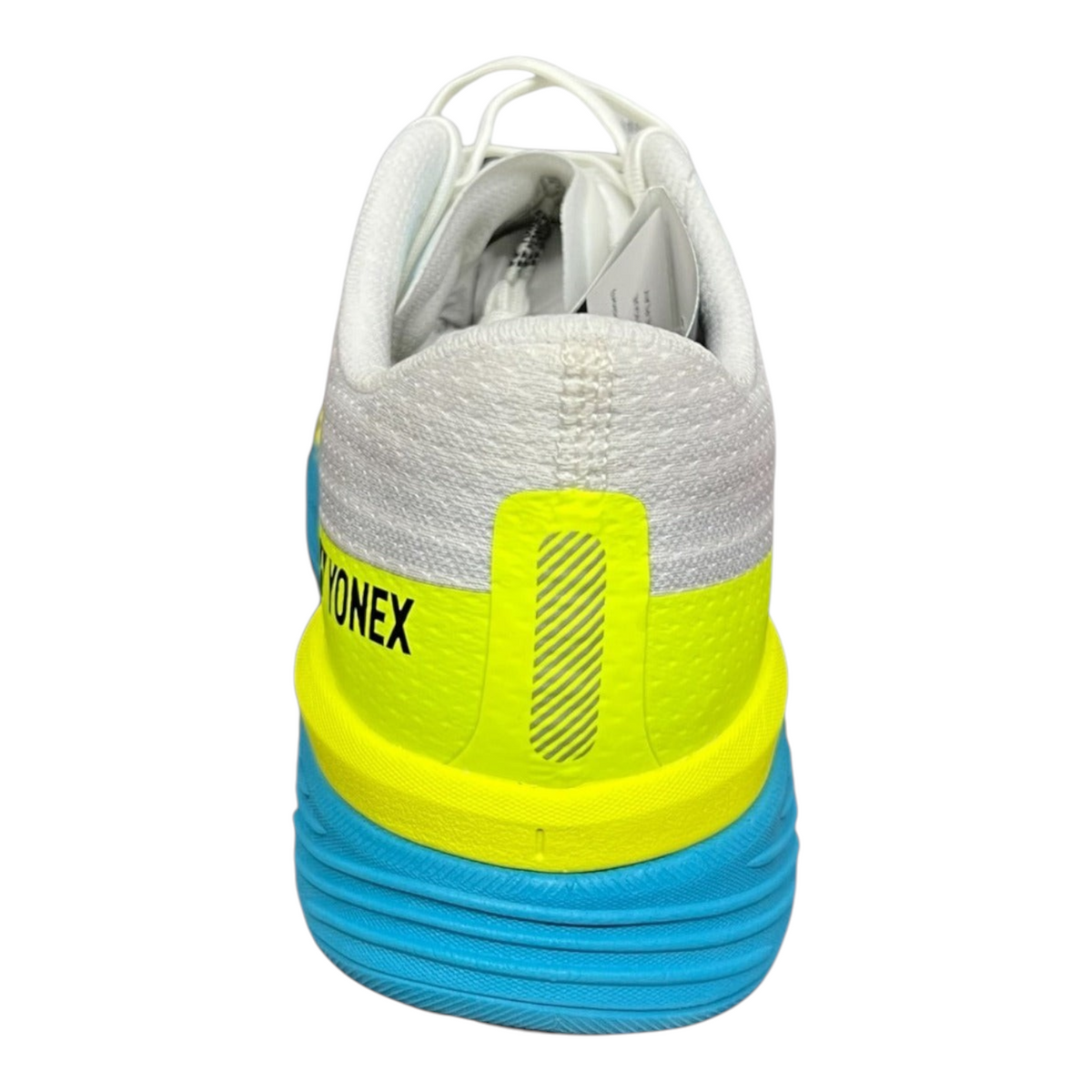 Vista trasera de tenis Radach Sports Yonex Saferun 100x blancos con detalles en amarillo neón y suela azul