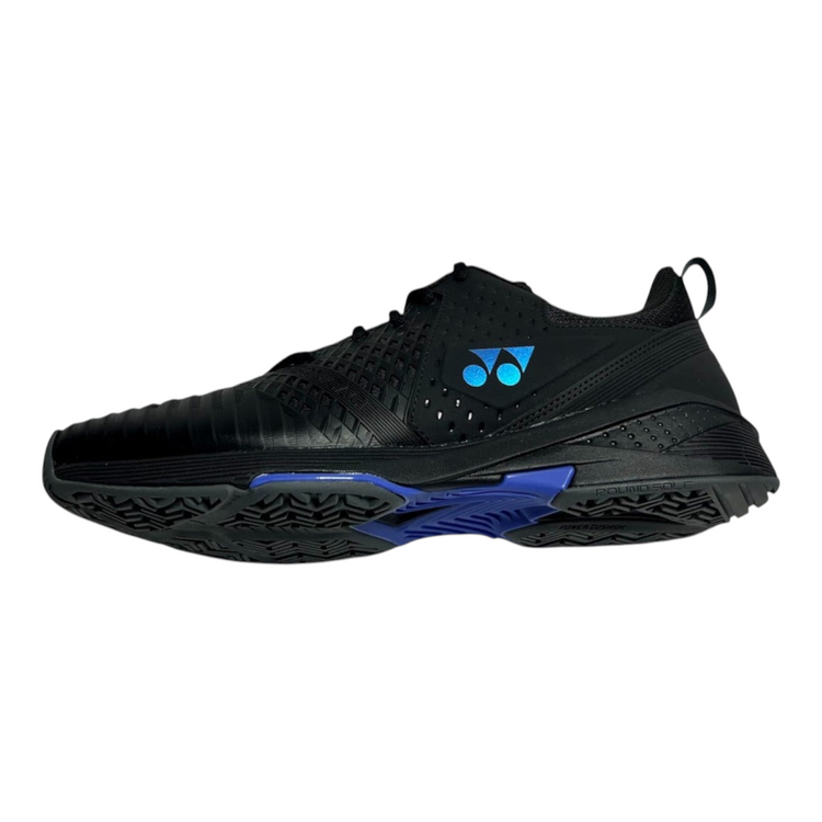 Tenis de tenis Radach Sports Yonex Sonicage 3 negros con detalles azules y tecnología Power Cushion para mayor soporte