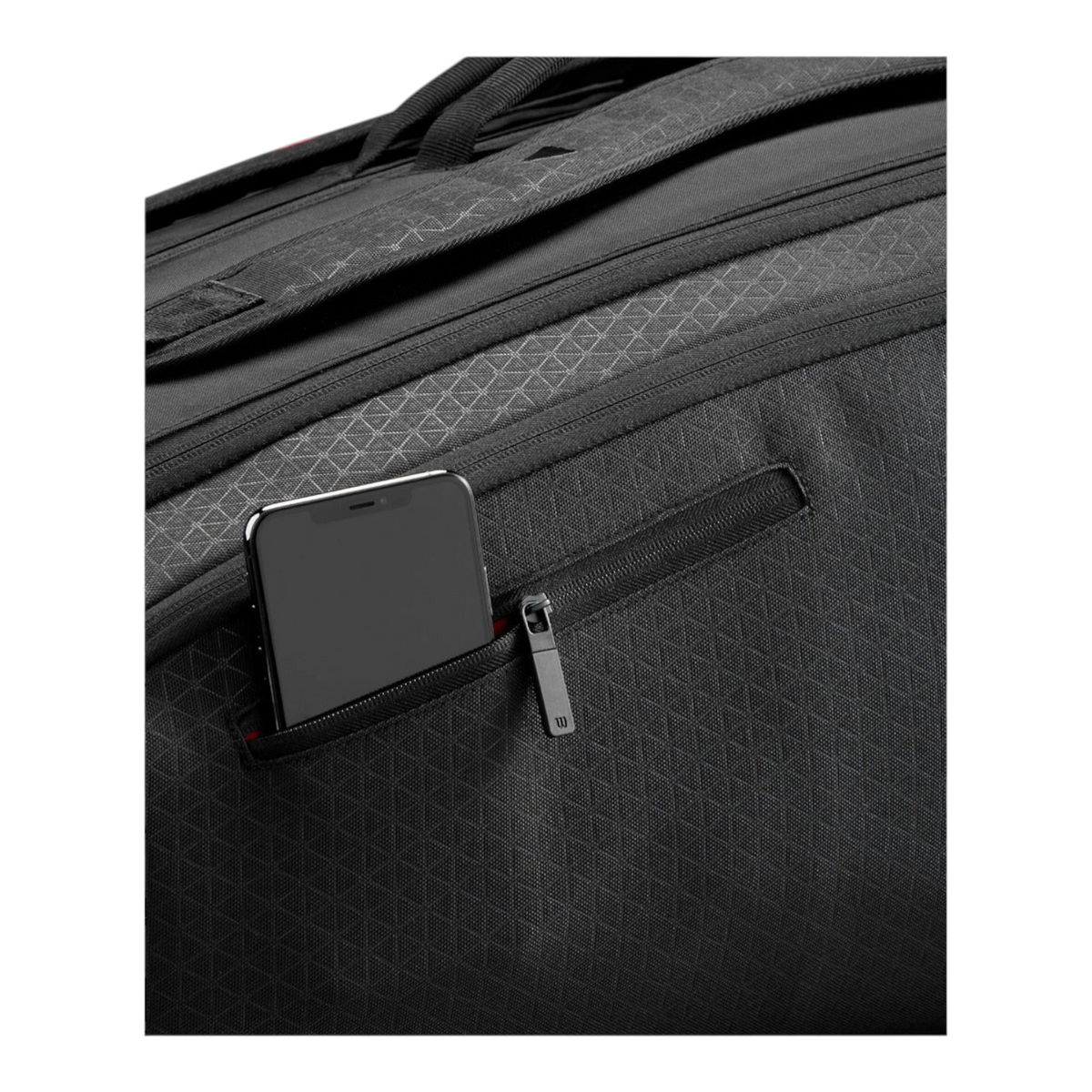 Detalle del bolsillo exterior con cremallera en el raquetero Radach Sports Wilson Clash V3 negro con patrón geométrico