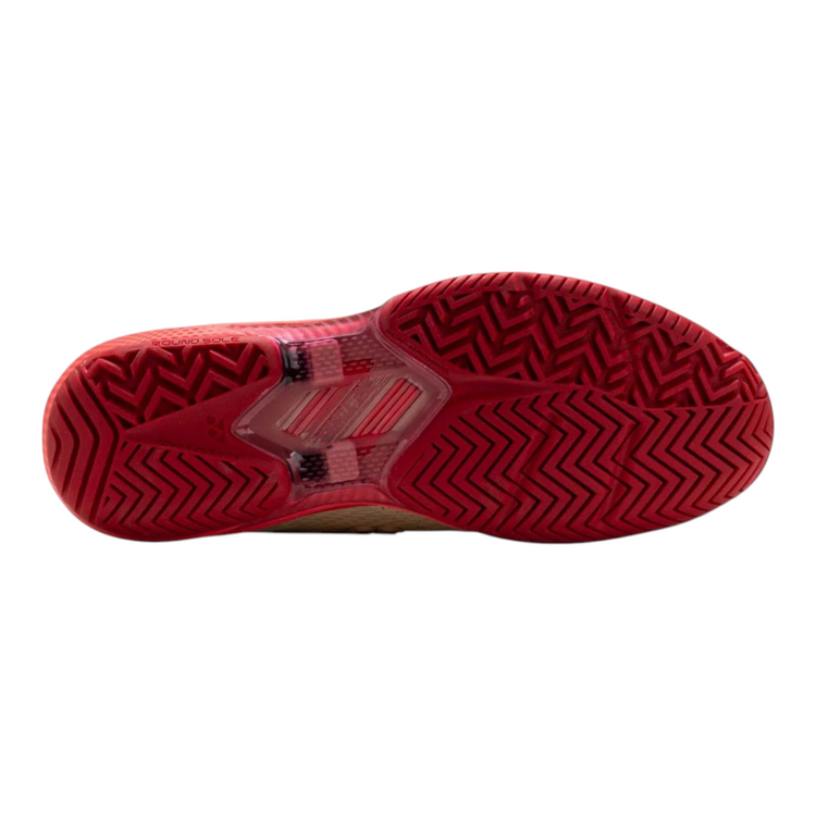 Suela roja de tenis Radach Sports Yonex Ad-accel con patrón de espiga para tracción y tecnología Round Sole